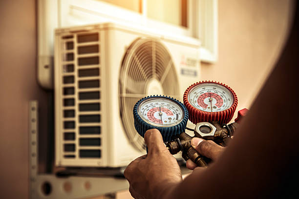 Professional Ac Installation technician working in Genoa City, WI